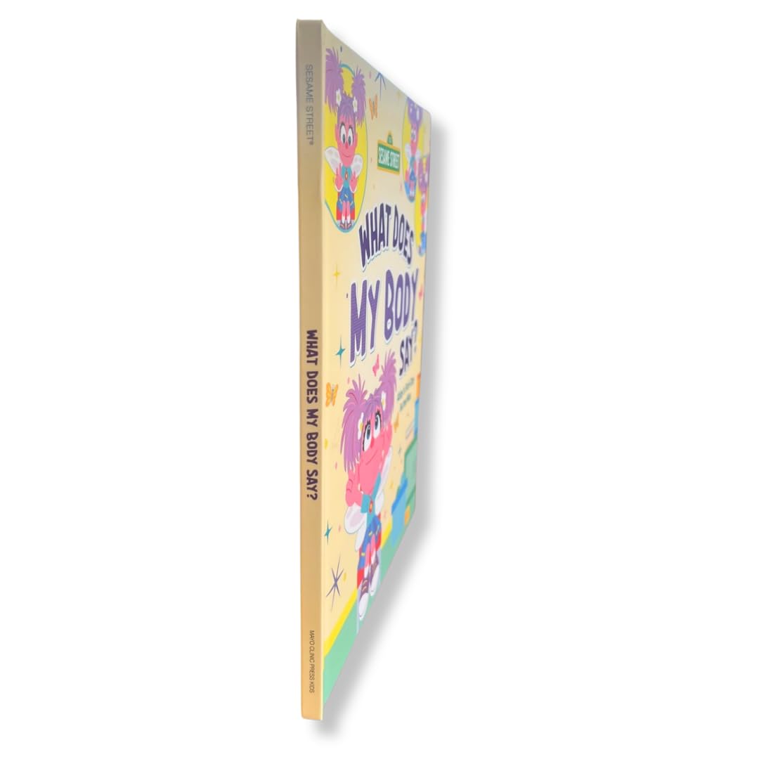Version 100 – To Speak Online Colorful children's book cover seen from the side, titled 'What Does My Body Say?' with playful characters on the front.