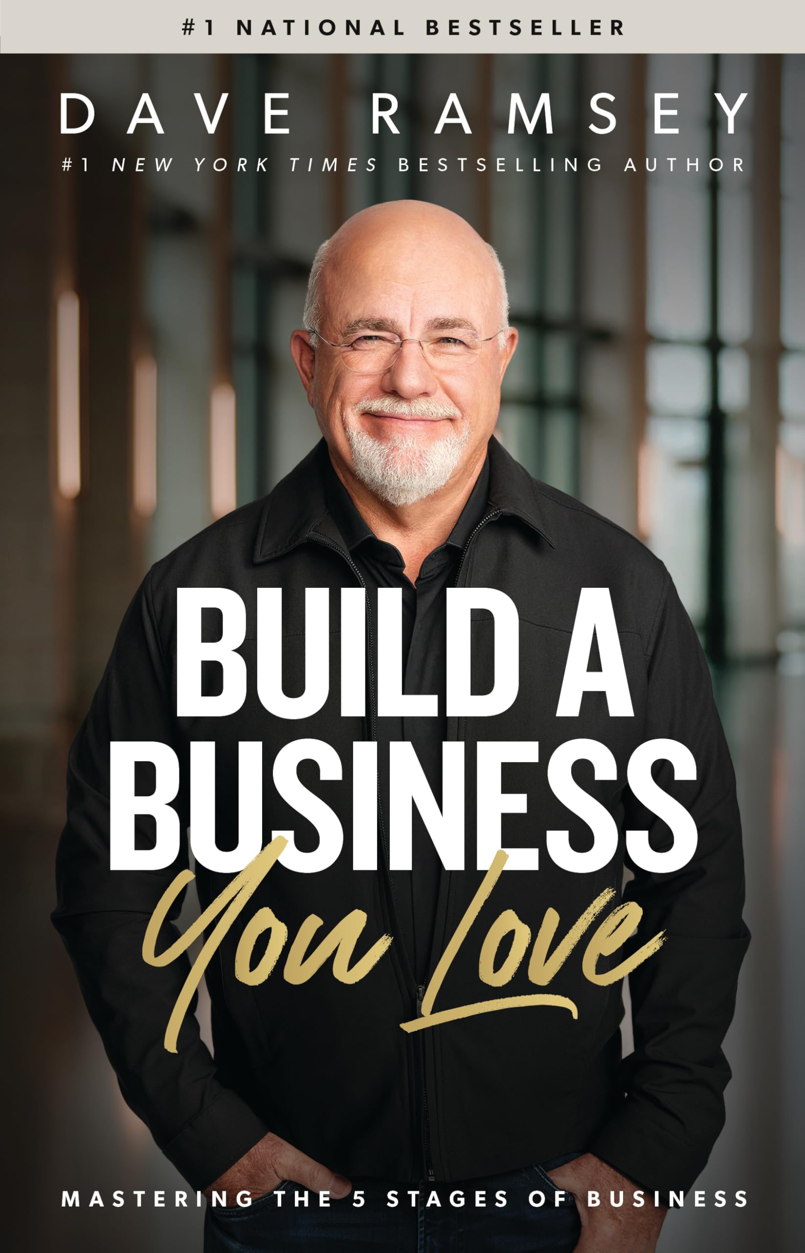 Version 100 – To Speak Online Book cover for 'Build a Business' by Dave Ramsey, featuring his portrait and the gold-script subtitle 'Grow Love' at the bottom.