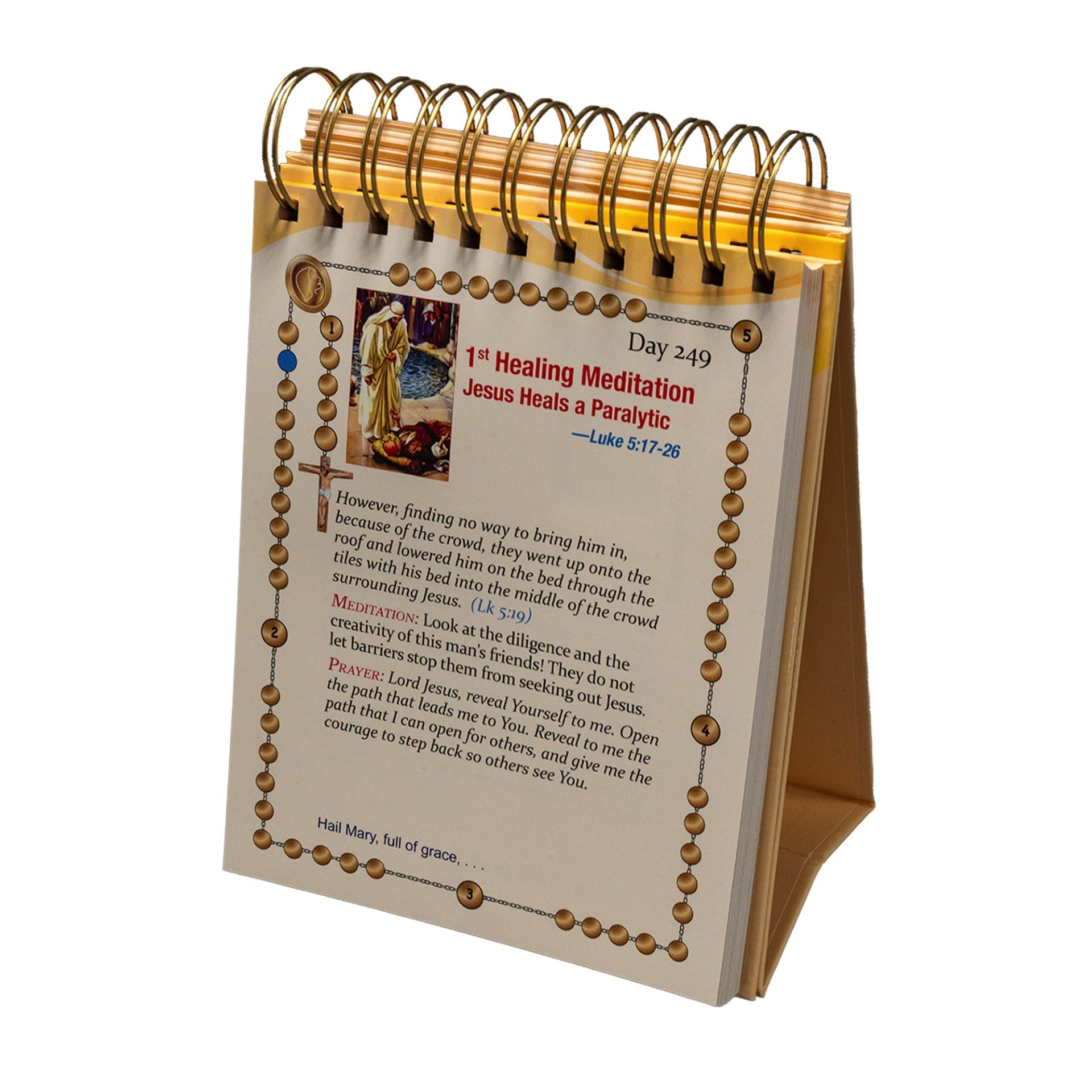 Version 100 – To Speak Online Close-up of a spiral-bound devotional booklet with a rosary bead border and a highlighted scripture reference Luke 5:17–26 on the page.