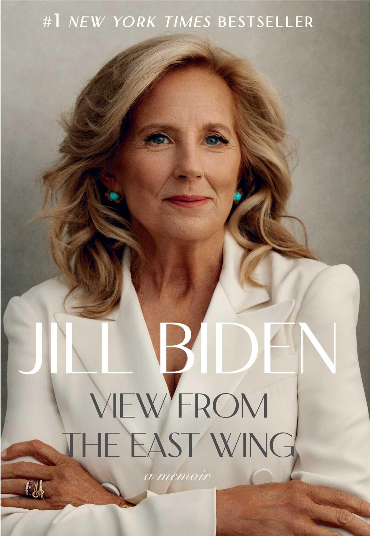 Version 100 – To Speak Online Close-up portrait of Jill Biden in a white blazer on her memoir cover, with '#1 New York Times Bestseller' headline above.