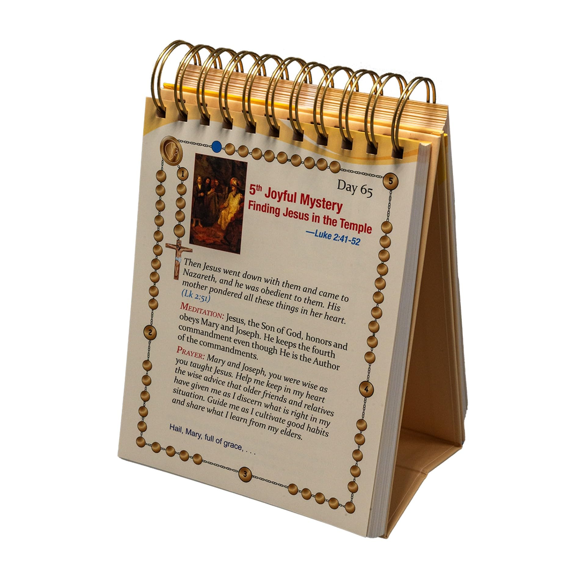 Version 100 – To Speak Online Spiral-bound devotional calendar page open to Day 65: 5th Joyful Mystery, Finding Jesus in the Temple, with bead border design and Bible verse reference Luke 2:41-52