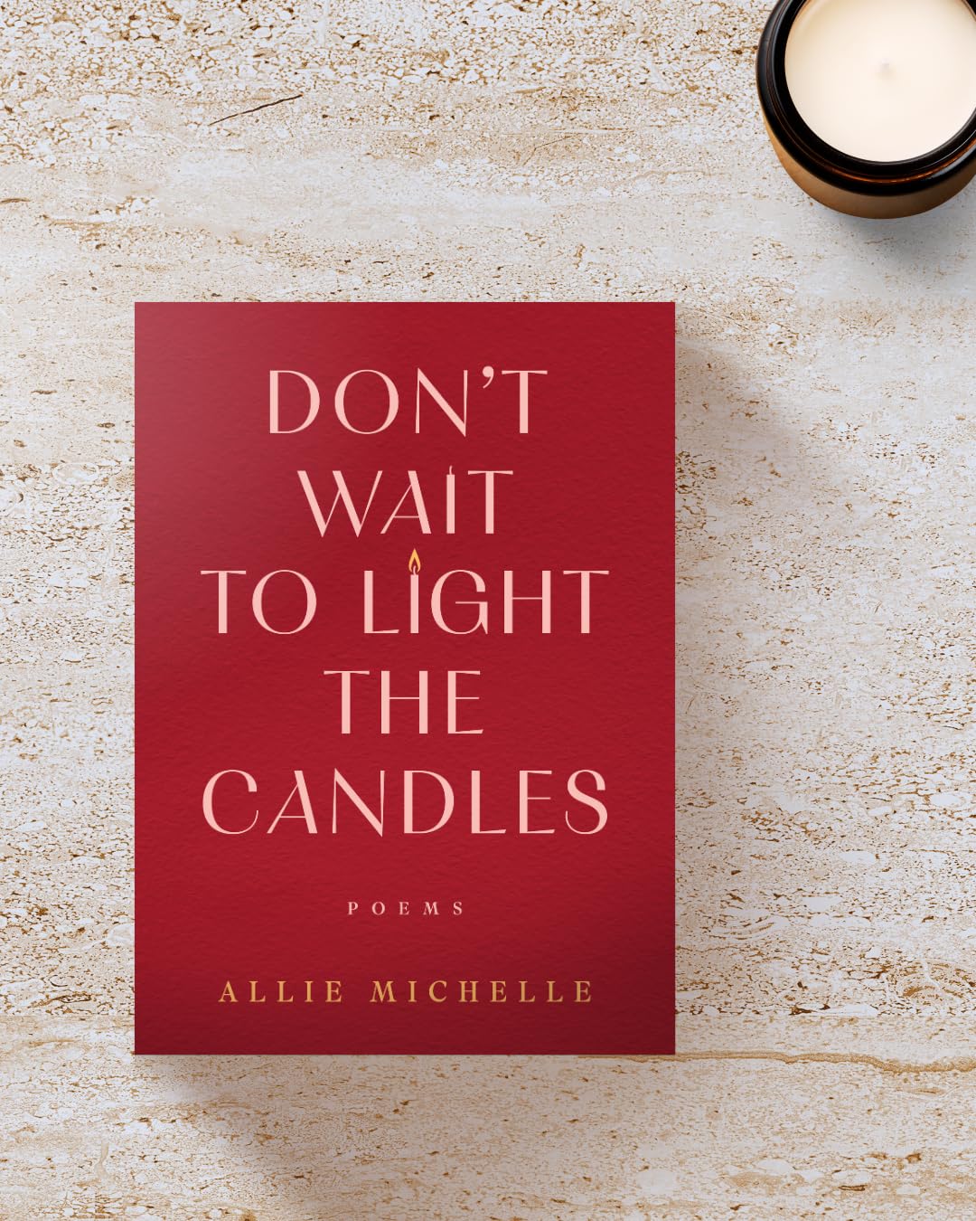 Version 100 – To Speak Online Red book cover titled 'Don't Wait to Light the Candles' by Allie Michelle, with a small candle flame graphic, on a light textured surface.
