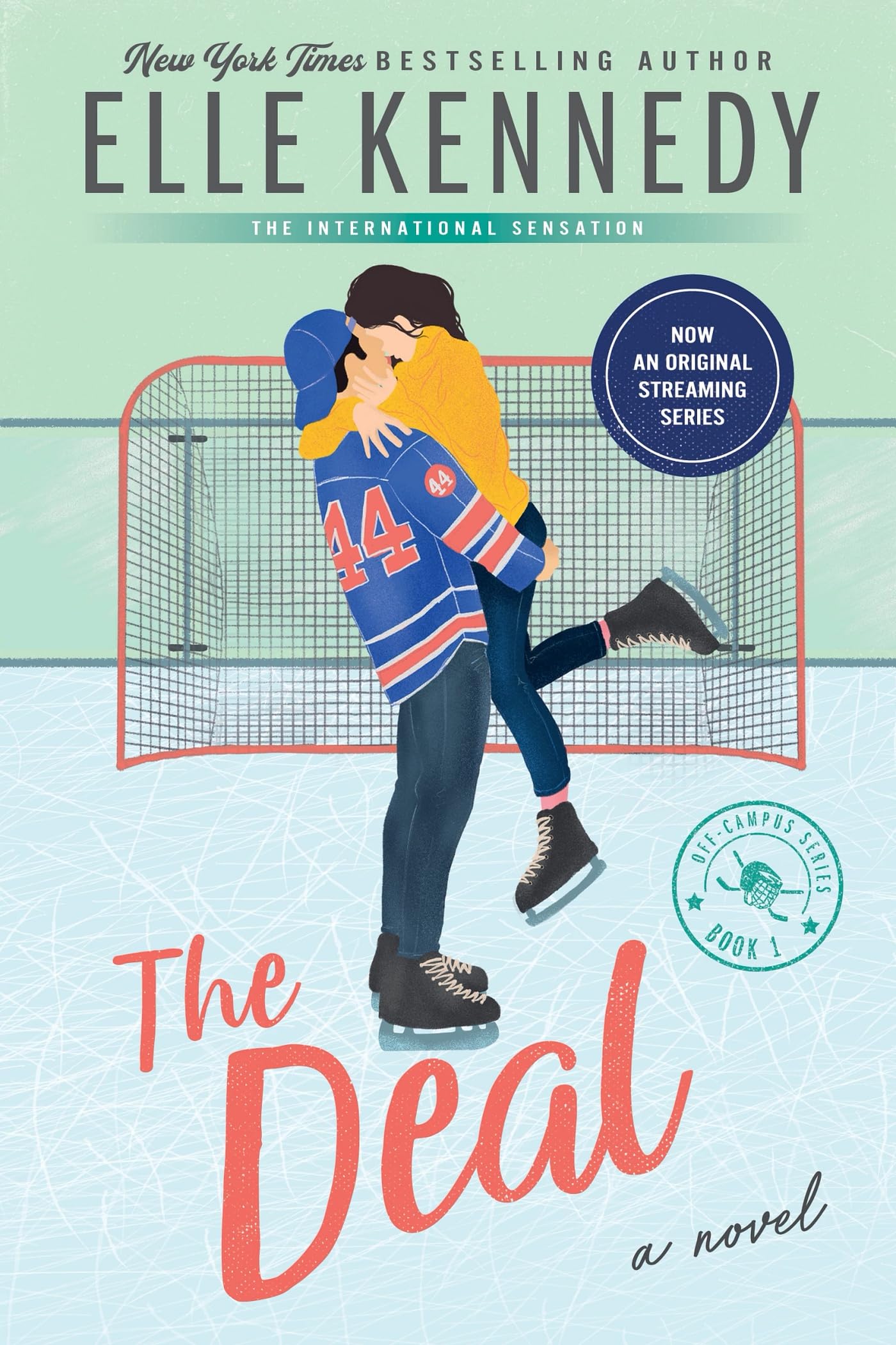 Version 100 – To Speak Online Illustration of a couple kissing inside a hockey goal against a mint background, with large 'Elle Kennedy' text above and a blue circular badge reading 'Now an original streaming series'.
