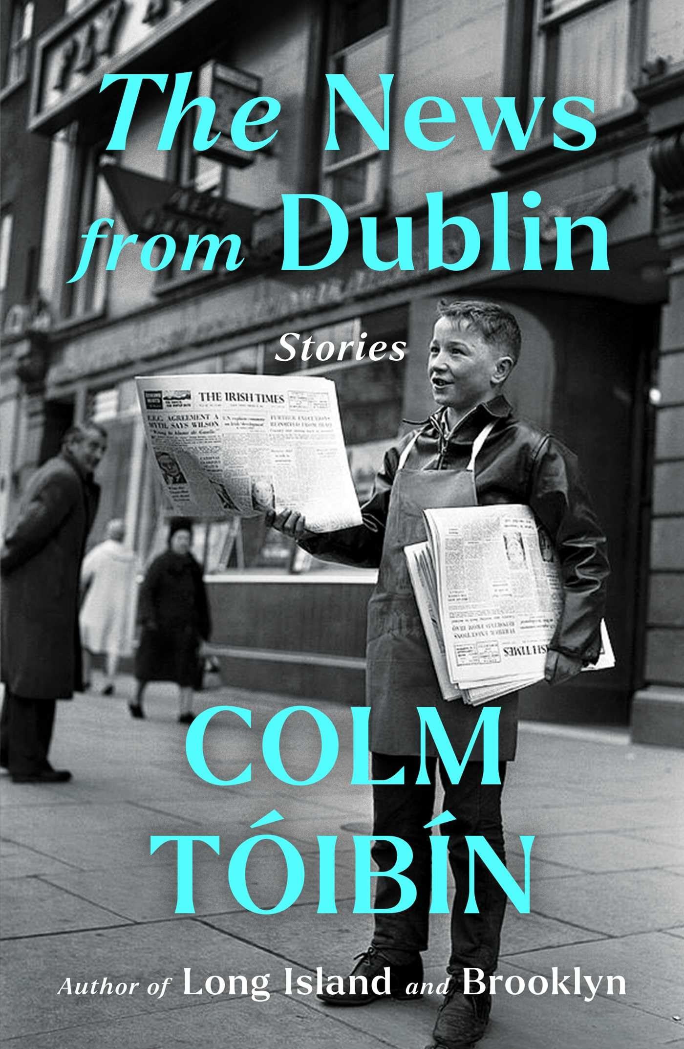 Version 100 – To Speak Online Book cover with a newspaper boy on a city street; bold turquoise text reads The News from Dublin across the image.