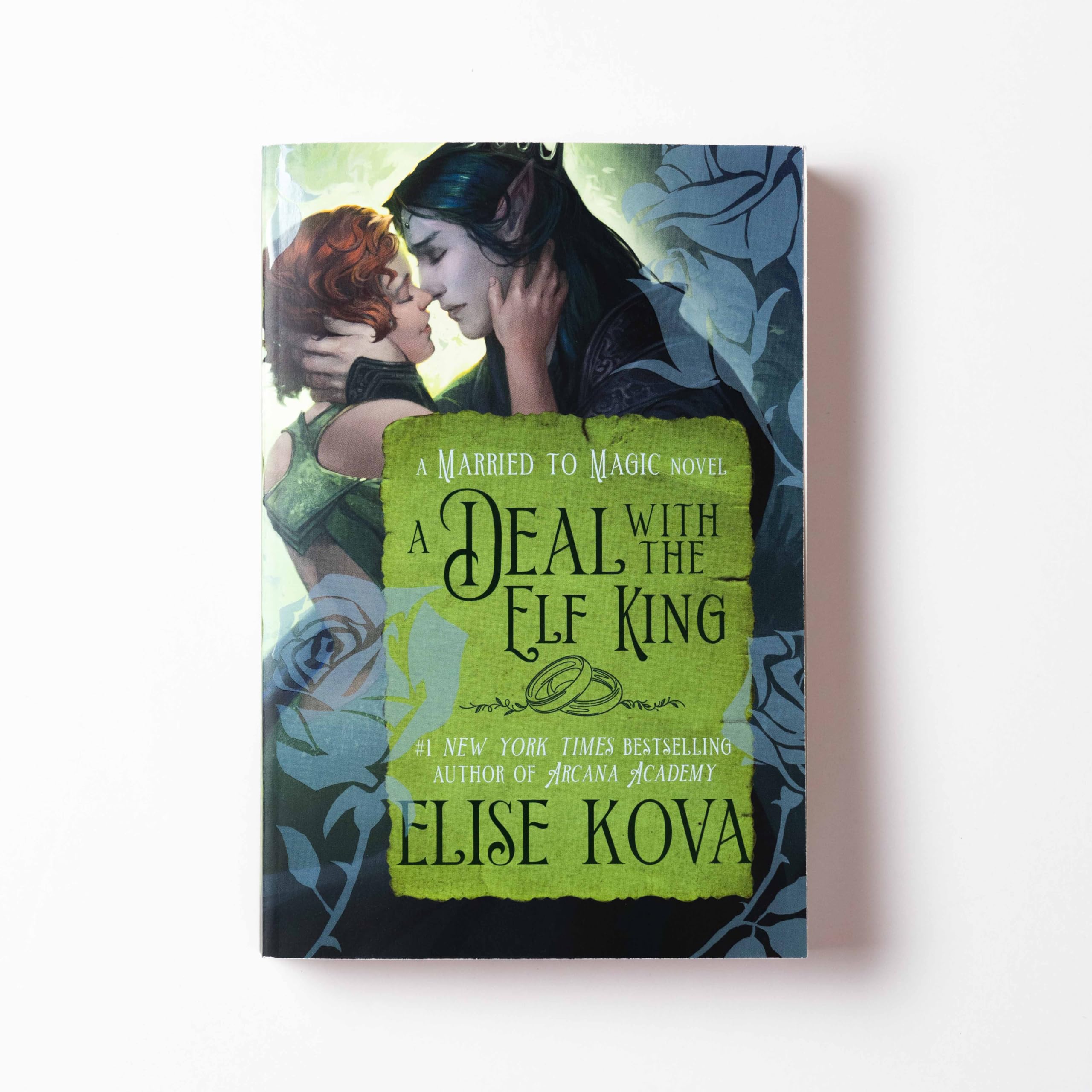 Version 100 – To Speak Online Book cover for 'A Deal with the Elf King' showing a man and woman embracing and about to kiss on a green-tinted title panel, fantasy artwork.